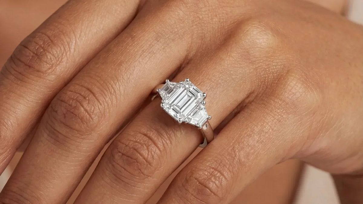 Close-up of a diamond ring in a female's hand