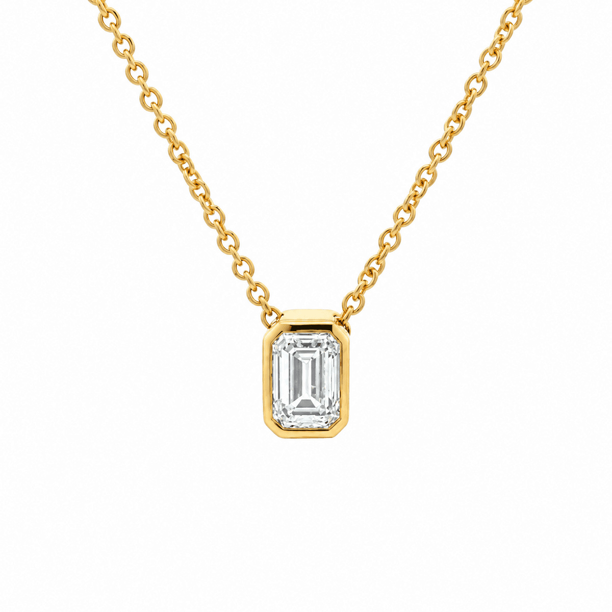 9ct YG Emerald Cut LGD 0.55ct E VVS2 Non-Certified Bezel Set Solitaire Pendant on a 45cm Chain